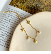 Load image into Gallery viewer, Dainty Gold Charm Beach Bracelet
